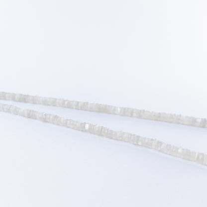 Moonstone smooth wheels arranged neatly, highlighting their soft colour tones and polished texture.