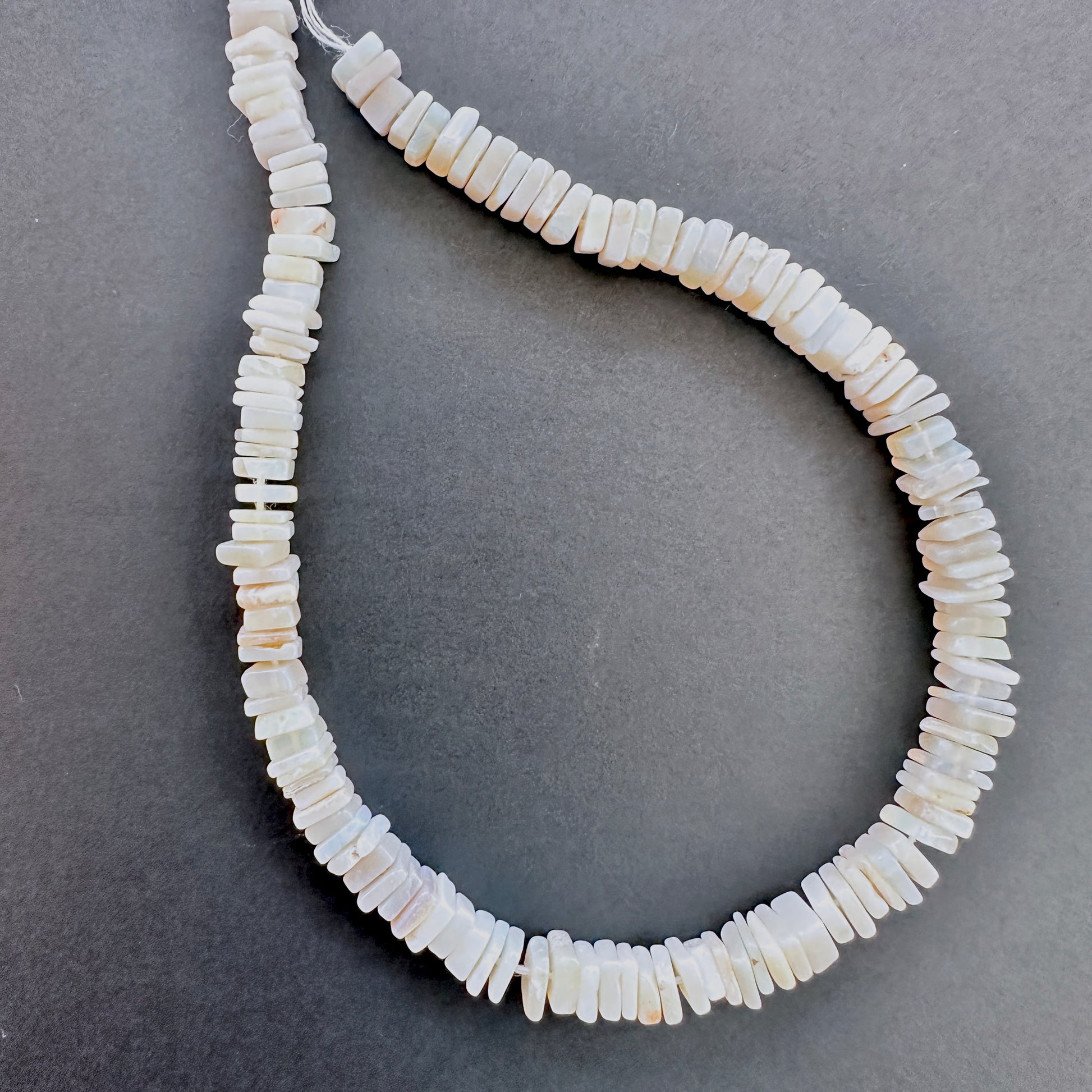 Moonstone stone beads with square heishi cut and premium polish.
