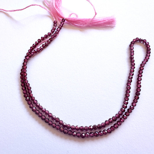Mozambique Garnet faceted rondelle beads with deep red sparkle for handmade jewellery components.