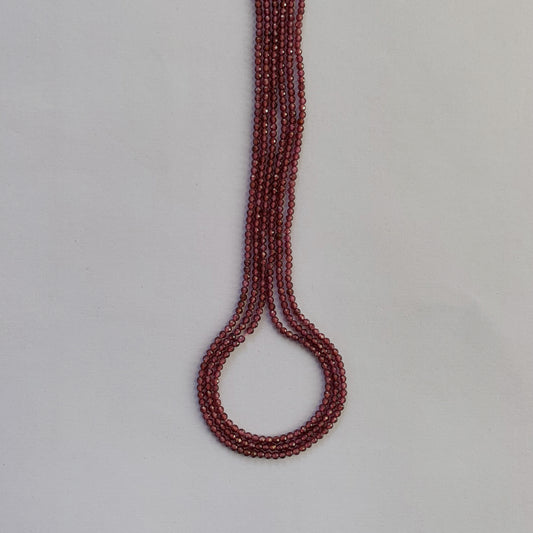 Mozambique Garnet rondelle beads in 2mm size, arranged in a faceted and shimmering 32cm strand.