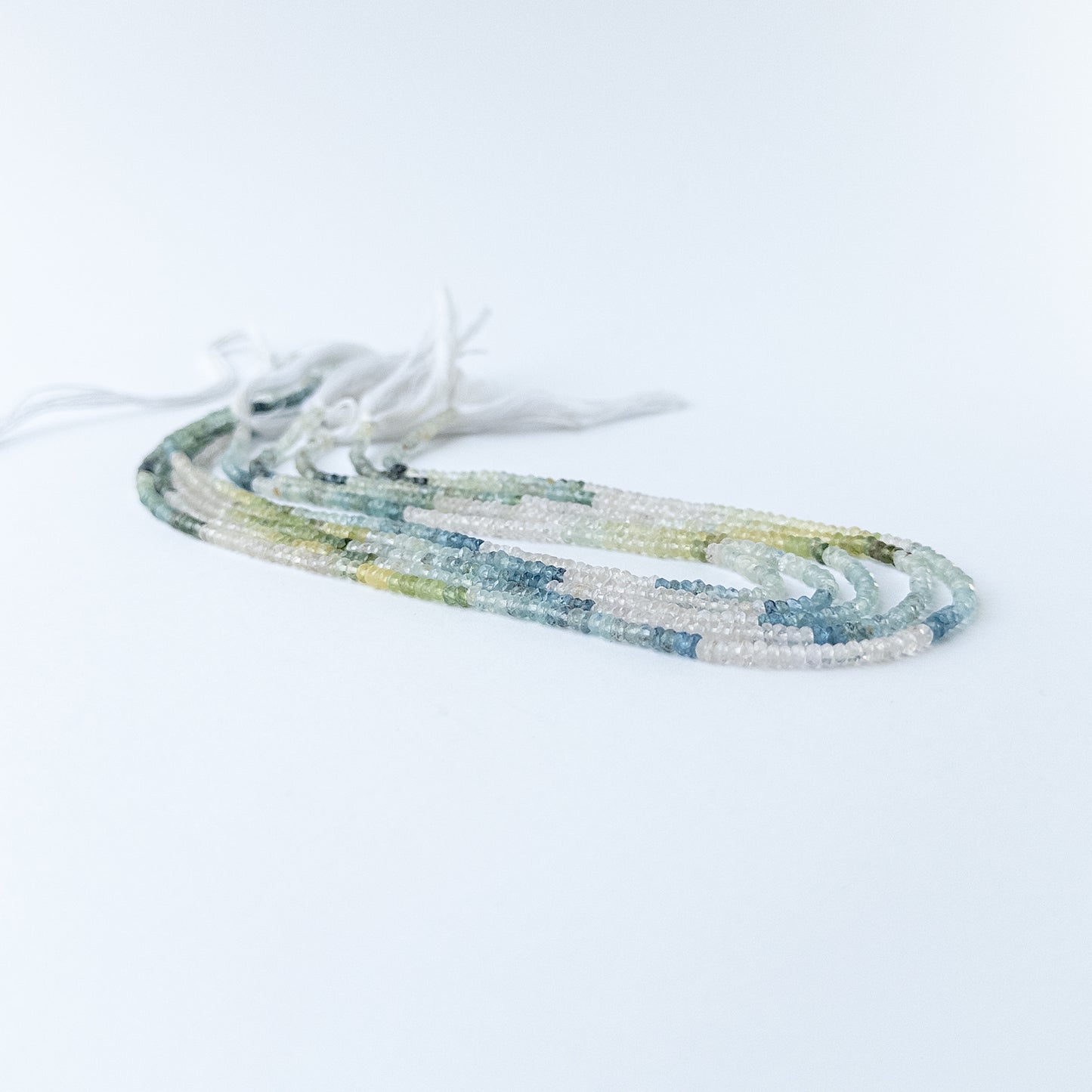 Authentic Multi Aquamarine gemstone beads showcasing soft blue colour, fine faceting and premium quality for jewellery designers.