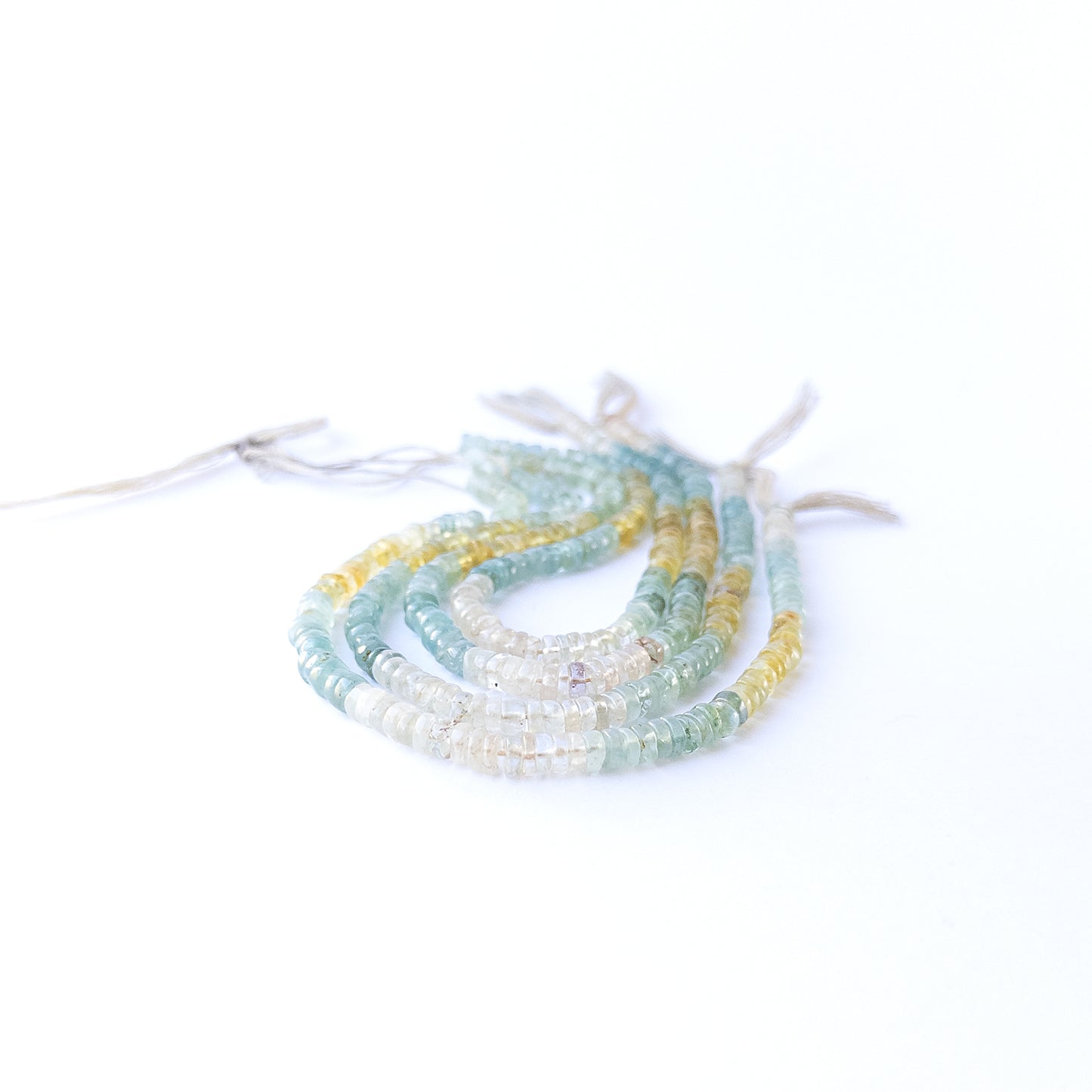 Authentic Multi Aquamarine gemstone beads with smooth heishi cut ideal for handmade jewellery components.
