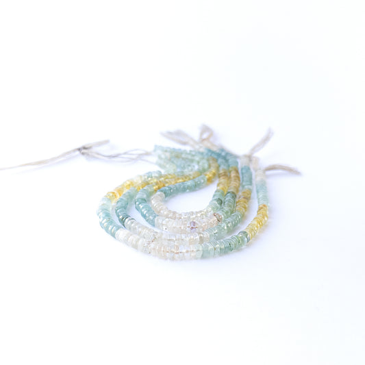 Authentic Multi Aquamarine gemstone beads with smooth heishi cut ideal for handmade jewellery components.