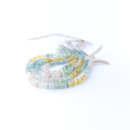 Multi Aquamarine smooth wheels displaying soft blue hues and premium craftsmanship in a 22cm strand.