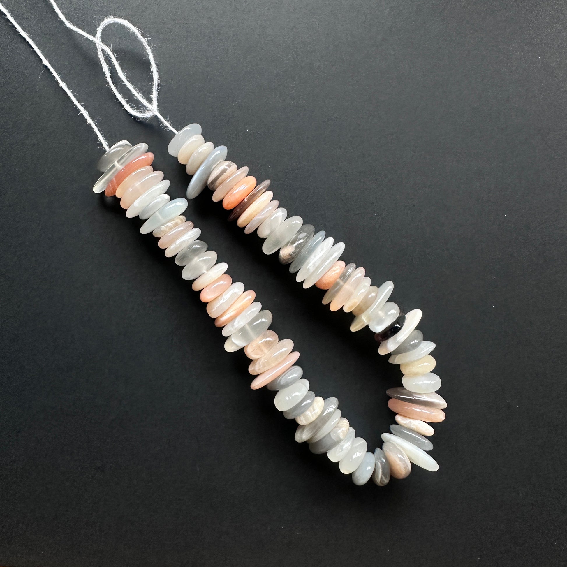 Handmade jewellery components made from polished Multi Moonstone beads on a 20cm strand.