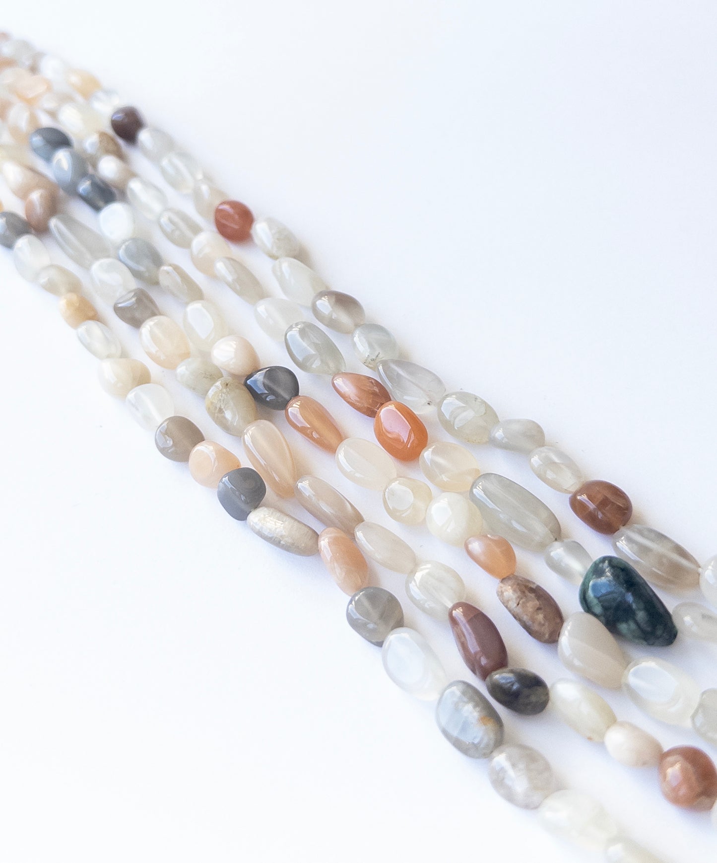 High‑quality Multi Moonstone beads arranged in a strand, perfect for gemstone jewellery making.