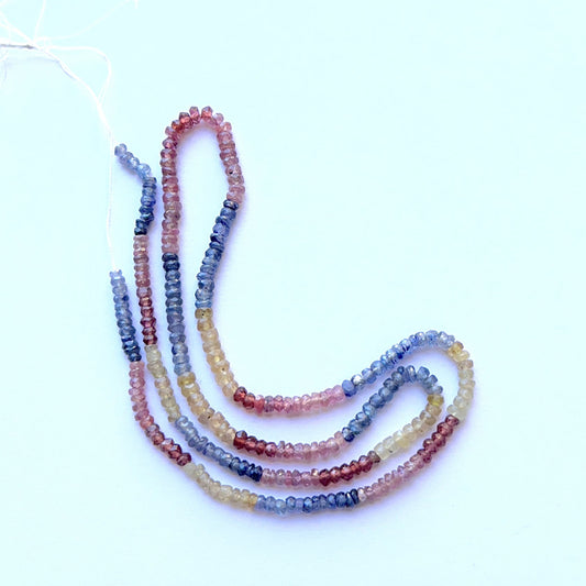 Multi‑precious faceted rondelle strand with ruby, yellow sapphire and blue sapphire 2.8–3.2mm on a 36cm or 41cm strand, vivid colour and sparkle.