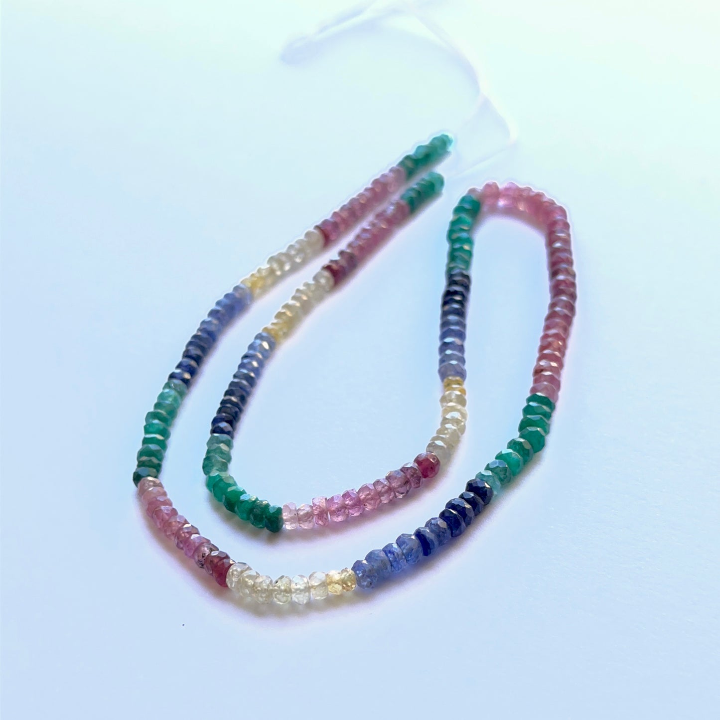 Gemstone beads faceted rondelle 3.3–4mm featuring ruby, yellow sapphire, blue sapphire and emerald for artisan designs.

