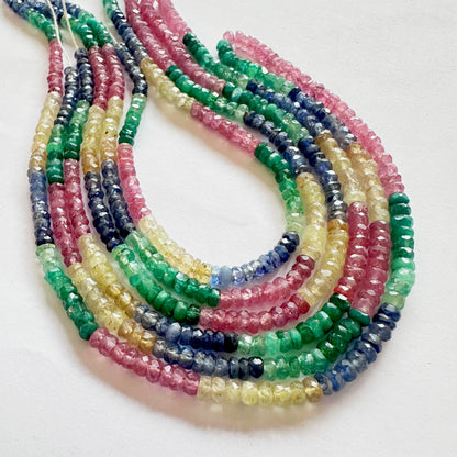 Multi-gemstone strand featuring rubies, sapphires and emeralds with excellent lustre.
