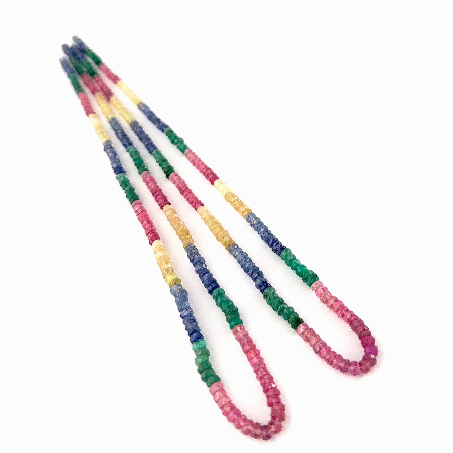 Hand‑cut Ruby, Emerald, Blue Sapphire and Yellow Sapphire rondelle beads with consistent sizing and radiant brilliance.