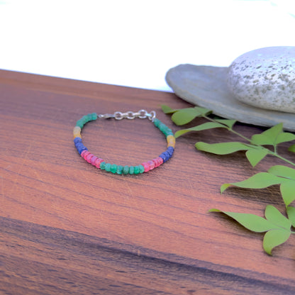 Natural gemstone bracelet with 4.5‚Äì5mm faceted beads in rich jewel tones.