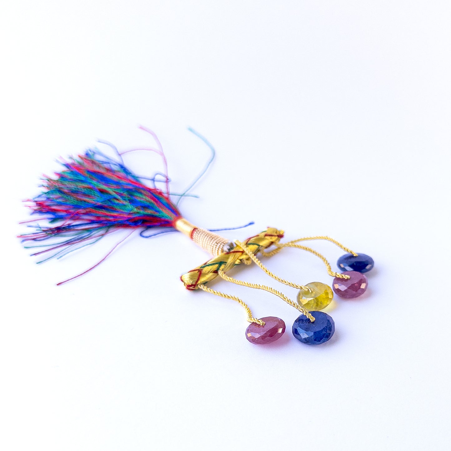 Multi Precious faceted rondelle beads in 11.5–12.5mm size, showcasing bold colour and sparkle.