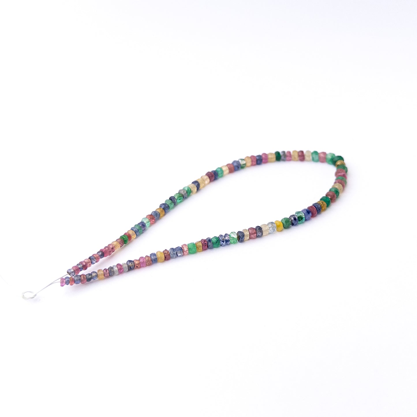 Vibrant Multi Precious stone beads featuring 3.1–4.5mm faceted rondelles arranged on a quality strand.