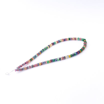 Vibrant Multi Precious stone beads featuring 3.1–4.5mm faceted rondelles arranged on a quality strand.