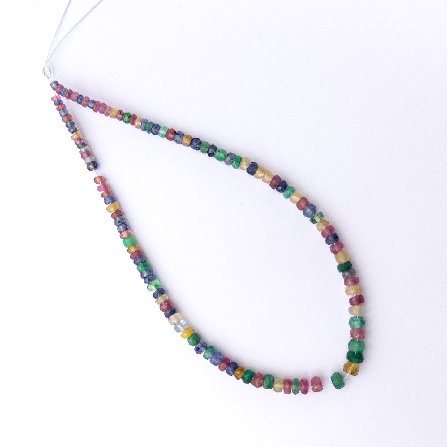 Genuine Multi Precious gemstone beads showcasing polished faceted rondelles perfect for artisan beadwork.