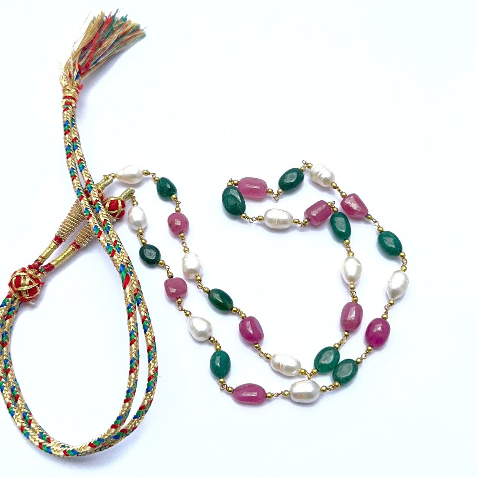 Colourful gemstone necklace with polished tumble beads showing shine and variation.