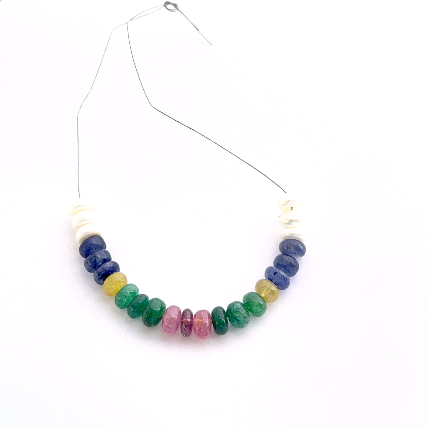 Strand of mixed freshwater pearls and multi precious smooth rondelle beads 6.2–6.7mm ideal for layered necklaces and artisan designs.