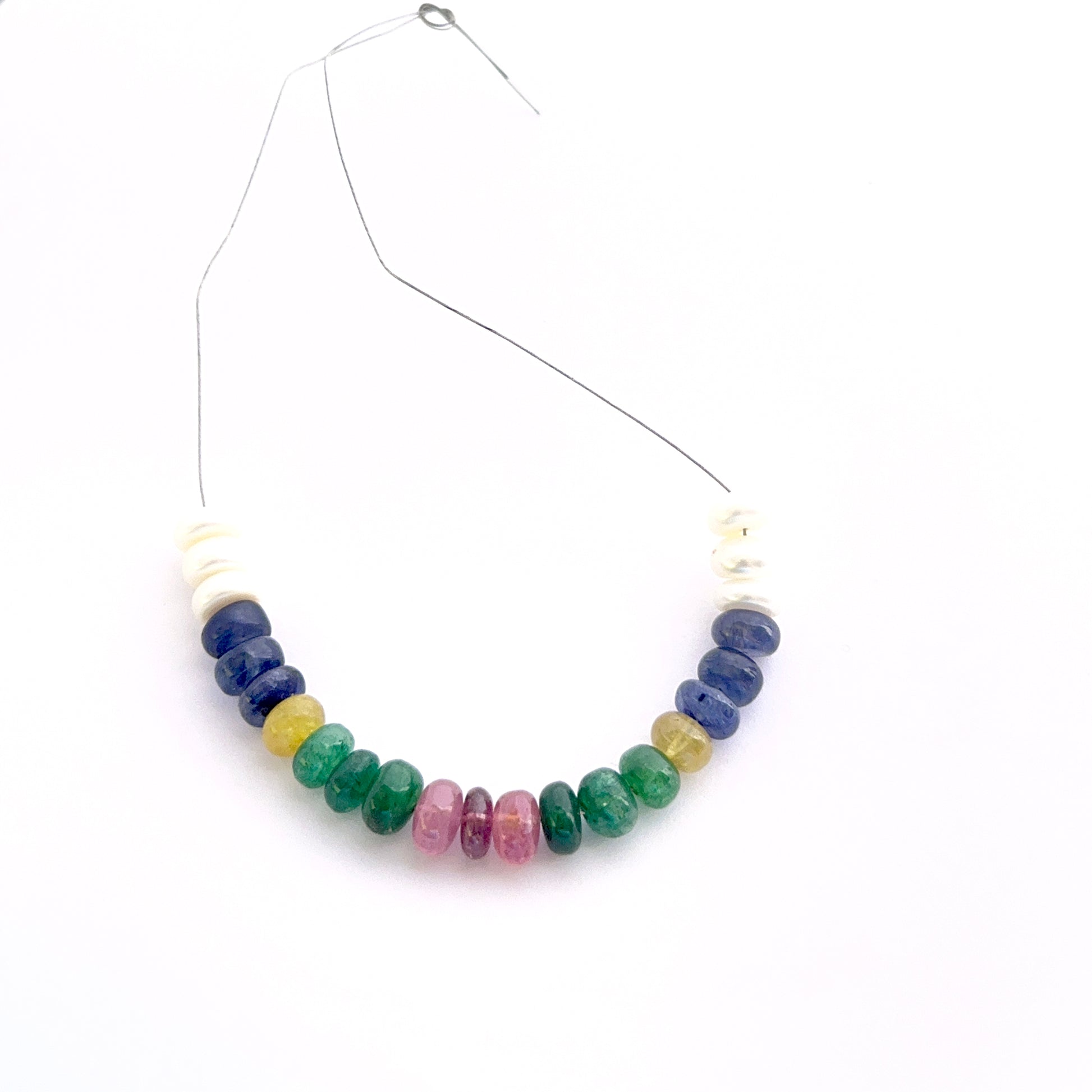 Strand of mixed freshwater pearls and multi precious smooth rondelle beads 6.2–6.7mm ideal for layered necklaces and artisan designs.