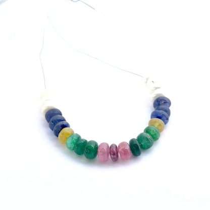 Set of 23 smooth rondelle freshwater pearls and multi precious beads 6.2–6.7mm totalling 35 carats, perfect for bespoke jewellery.