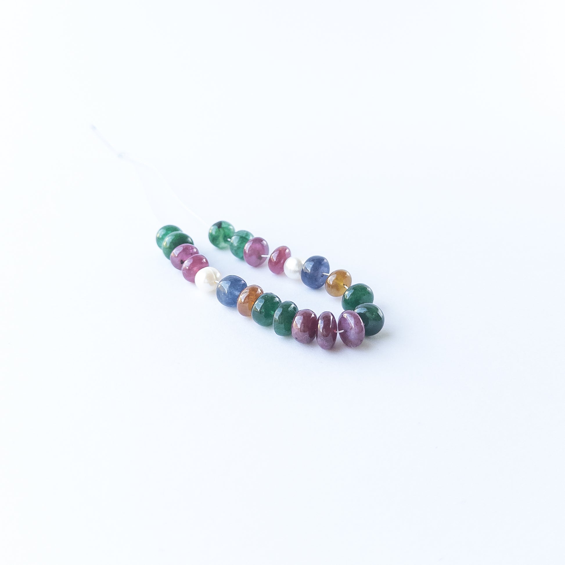 High‑quality multi precious rondelle beads paired with freshwater pearls showing elegant colour contrast.