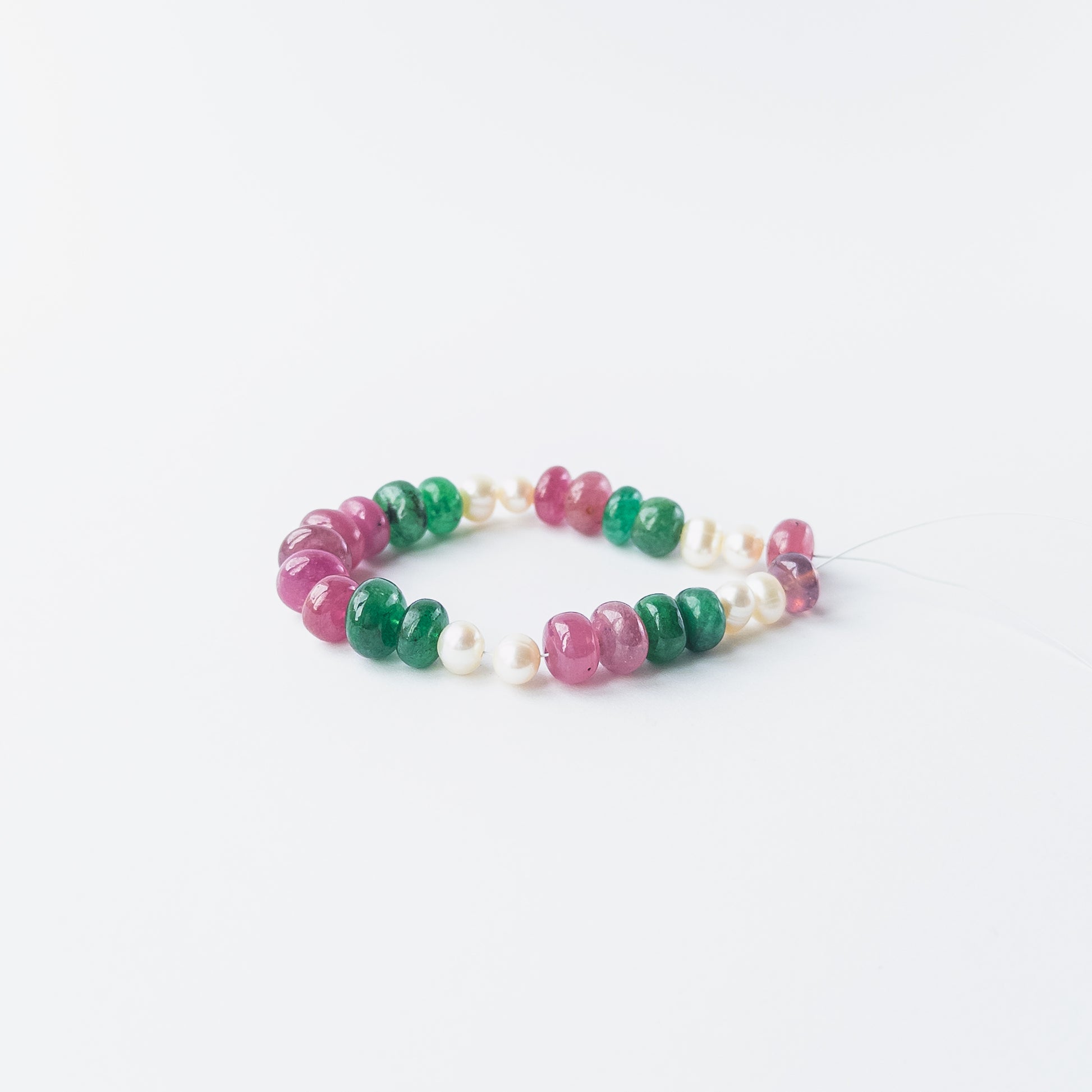 High‑quality smooth rondelle precious gemstone beads paired with pearls for handmade jewellery components.