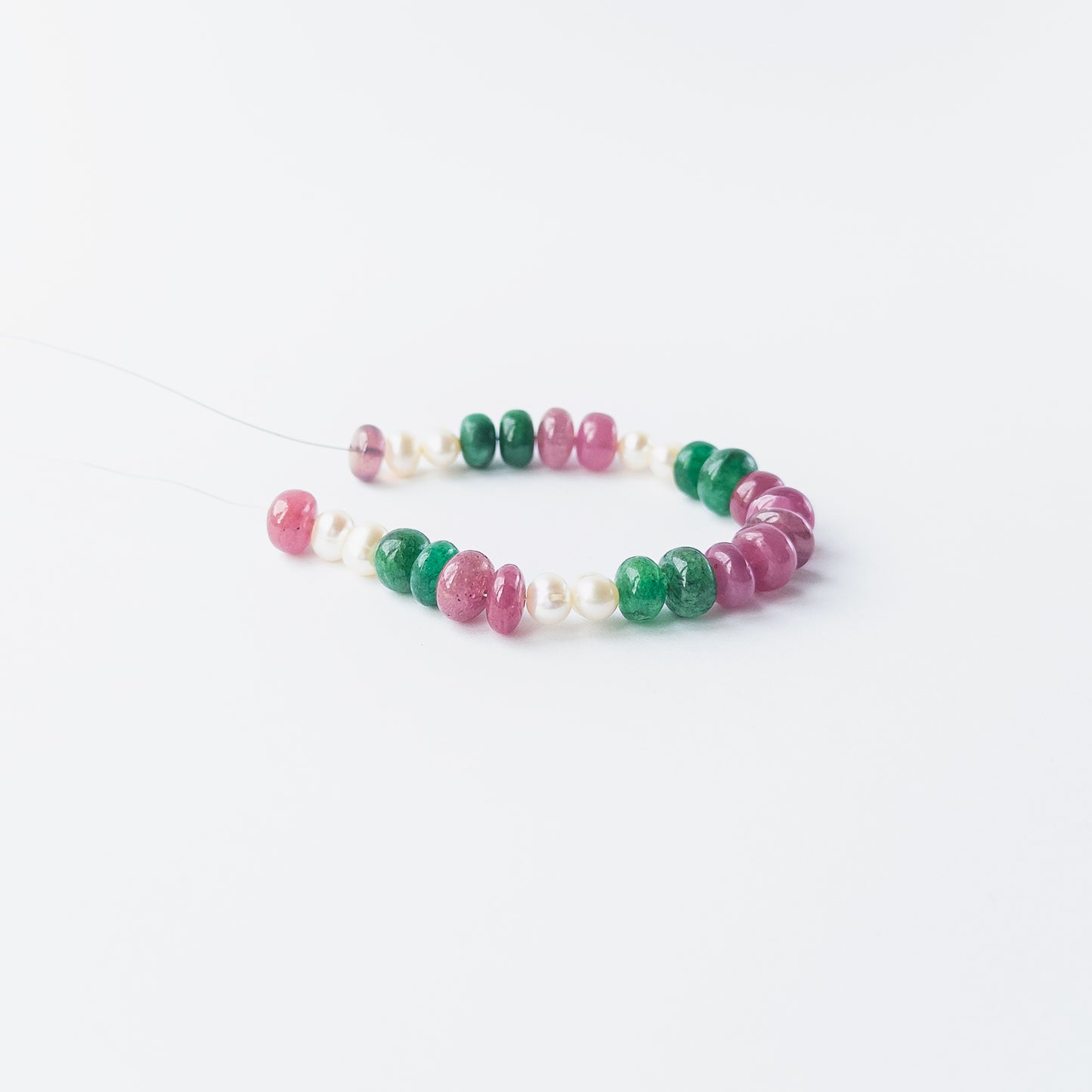 Multi precious rondelle beads and pearls displaying elegant colour contrast and refined craftsmanship.