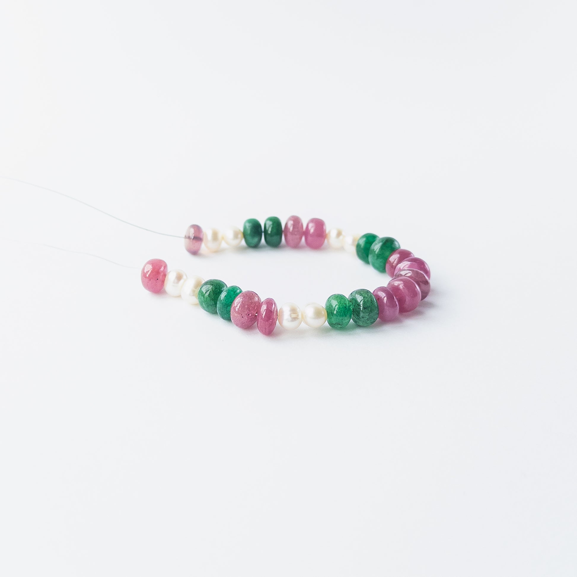 Multi precious rondelle beads and pearls displaying elegant colour contrast and refined craftsmanship.