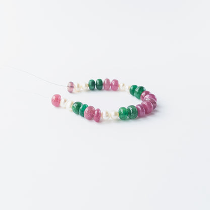 Multi precious rondelle beads and pearls displaying elegant colour contrast and refined craftsmanship.