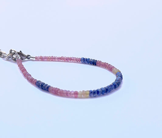 Elegant multi gemstone bracelet featuring polished rondelle beads in a refined layout.