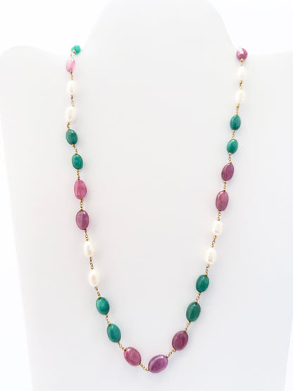 Elegant gemstone necklace with pearls, emeralds, and rubies, single strand, 193 carats of brilliance.