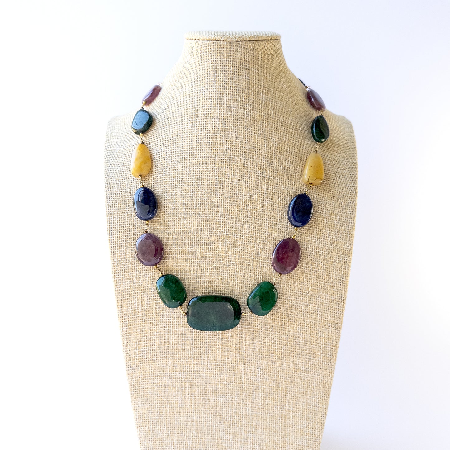 Vibrant Multi Precious smooth tumble beads arranged in a 45cm necklace for handmade gemstone jewellery.