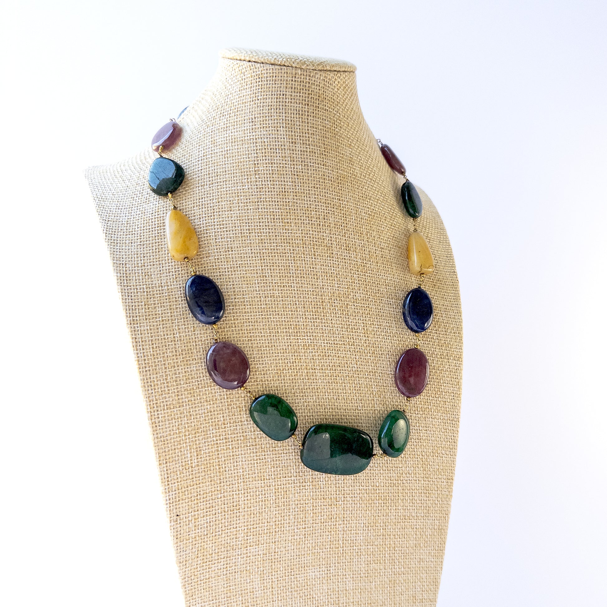 Genuine Multi Precious gemstone beads with polished tumble shapes, ideal for DIY jewellery and artisan beadwork.