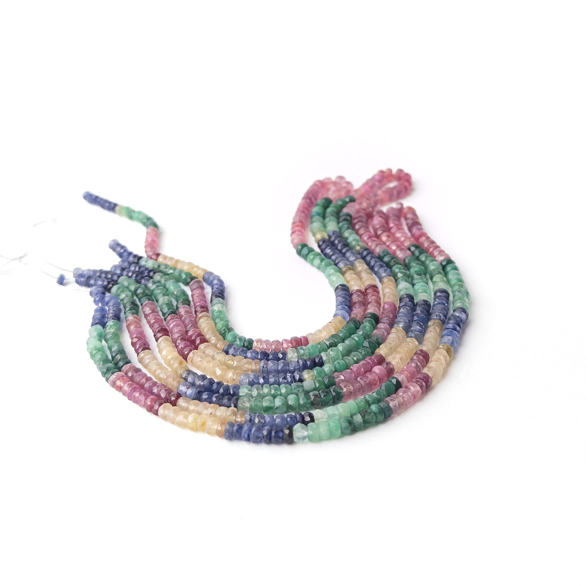 Genuine multi precious gemstone beads arranged on a 41cm strand with rich red blue yellow and green tones.