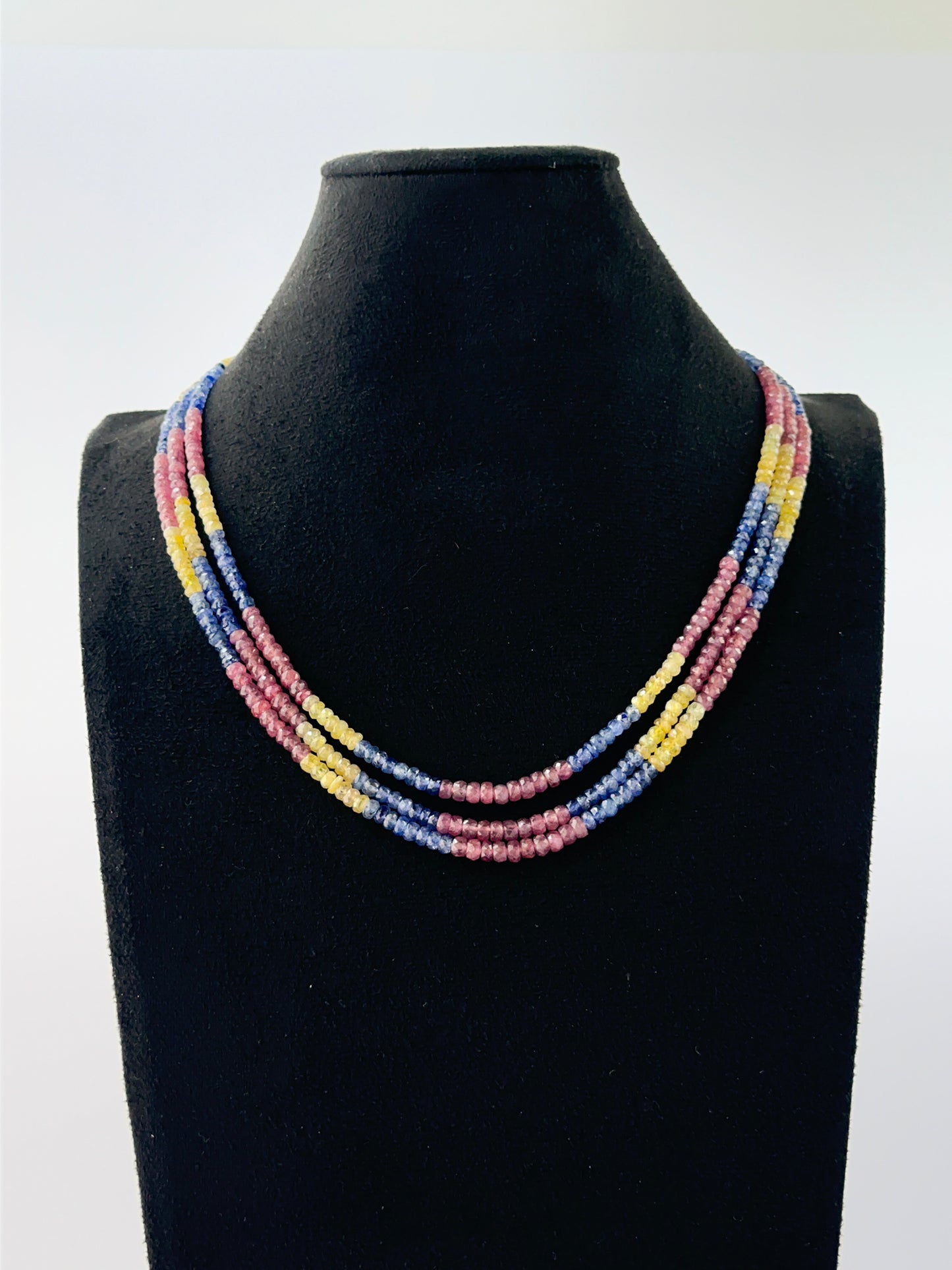 Elegant triple‑strand multi‑precious necklace showcasing faceted 4–4.5mm rondelle beads.