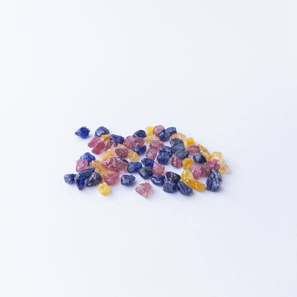 Premium undrilled Ruby, Blue Sapphire and Yellow Sapphire rough stones with organic shapes.