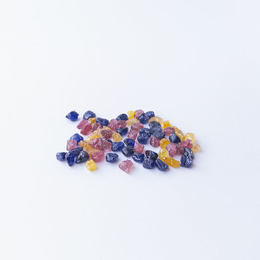 Premium undrilled Ruby, Blue Sapphire and Yellow Sapphire rough stones with organic shapes.