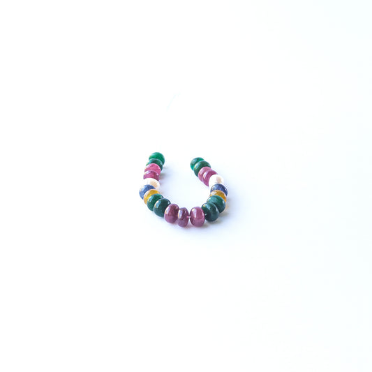 Multi‑precious Ruby, Emerald, Sapphire and Freshwater Pearl smooth rondelle beads arranged in a vibrant strand.