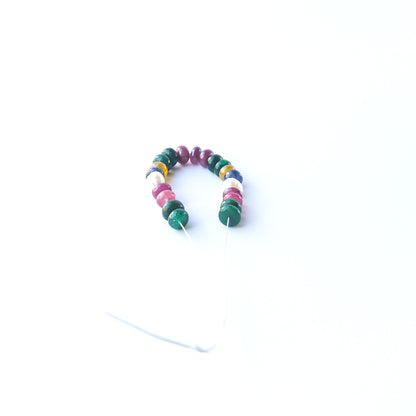 Handmade jewellery components featuring multi‑precious rondelle beads with polished finish and elegant gemstone tones.