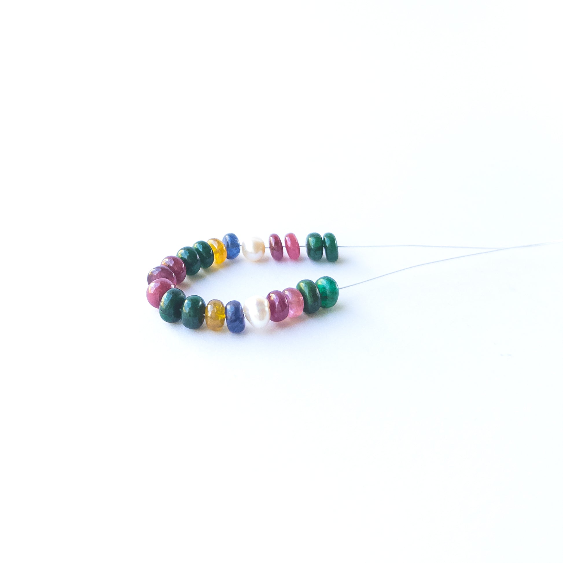 Authentic multi‑precious rondelle gemstone beads with rich colours and lustrous pearls for DIY jewellery making.