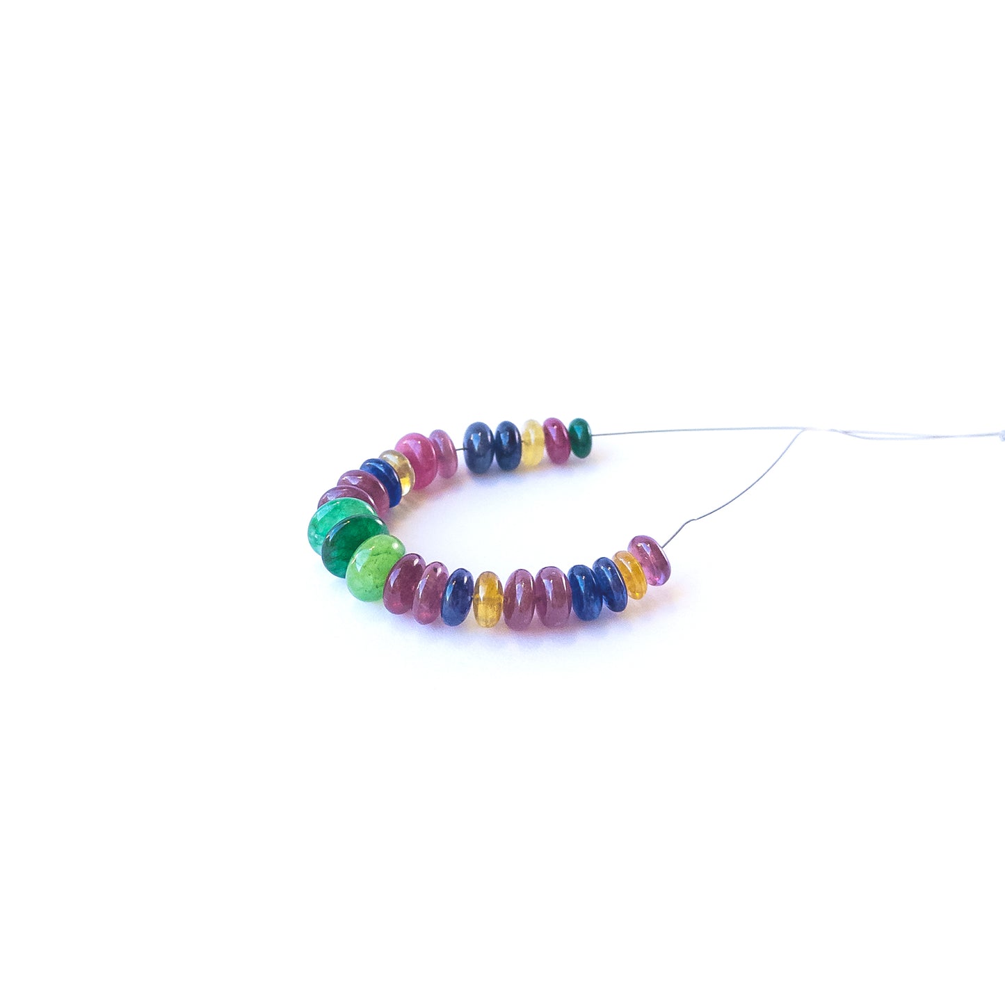Authentic multi‑precious rondelle gemstone beads in rich red, green and blue hues for DIY jewellery making.
