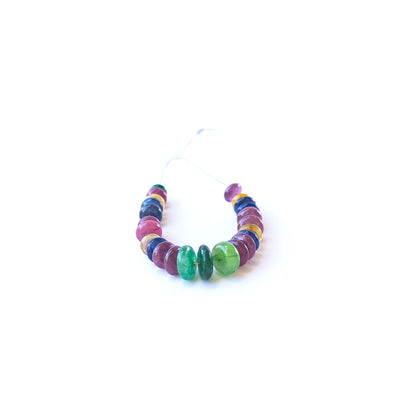 Handmade jewellery components featuring multi‑precious rondelle beads with polished finish and vibrant gemstone tones.