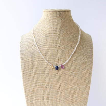 Delicate Precious Stone and Herkimer Diamond beads arranged in a faceted teardrop and chip necklace for jewellery making.