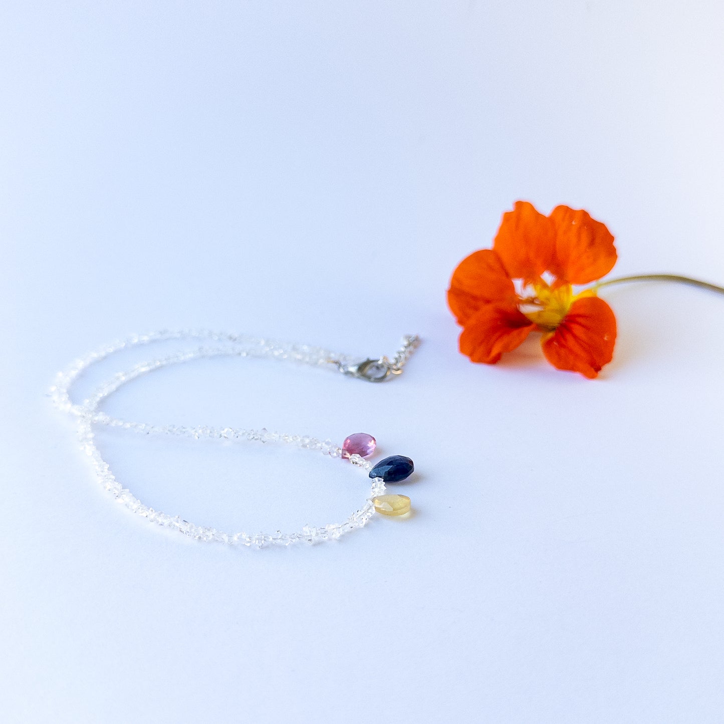 Premium Precious Stone and Herkimer Diamond beads arranged in a strand necklace for DIY jewellery makers.