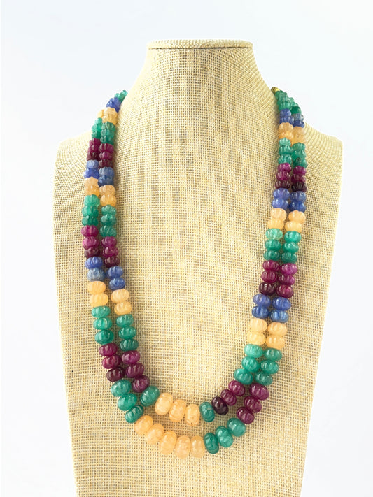 Two‑strand multi‑quartz necklace featuring carved pumpkin beads sized 8–12mm in layered lengths.