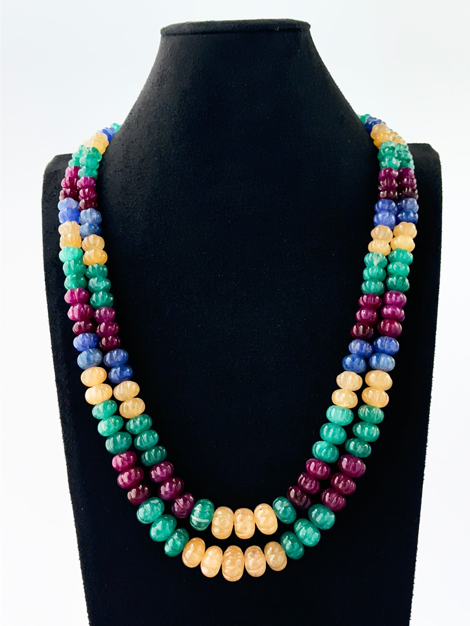 Elegant two‑strand quartz necklace showcasing carved 8–12mm pumpkin beads.