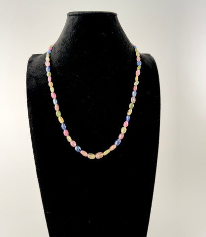 Close‑up of multi Sapphire faceted oval beads highlighting their sparkle, colour depth and polished craftsmanship.