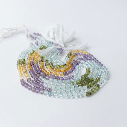 Authentic Aquamarine, Citrine, Amethyst and Peridot beads showing vibrant colours and smooth shine.