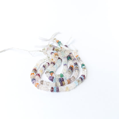Handmade jewellery components featuring multi stone carved pumpkin beads with vibrant mixed hues.