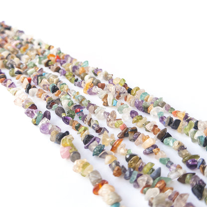 Multi‑stone chip gemstone beads arranged in a colourful strand for handmade jewellery making.