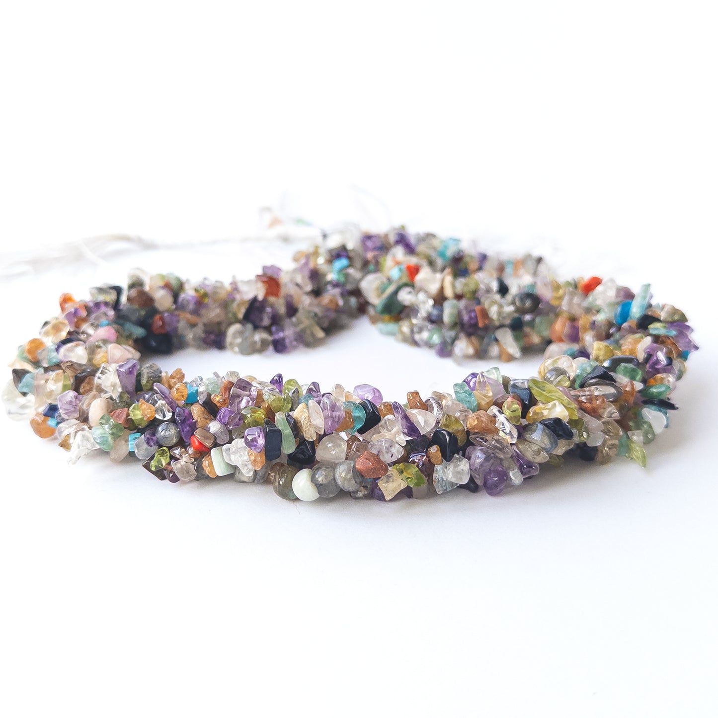 Multi‑stone chip beads displaying natural colour variation and premium craftsmanship.